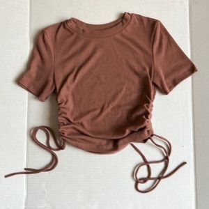 Zara mauve colored ribbed short sleeved top with side ties